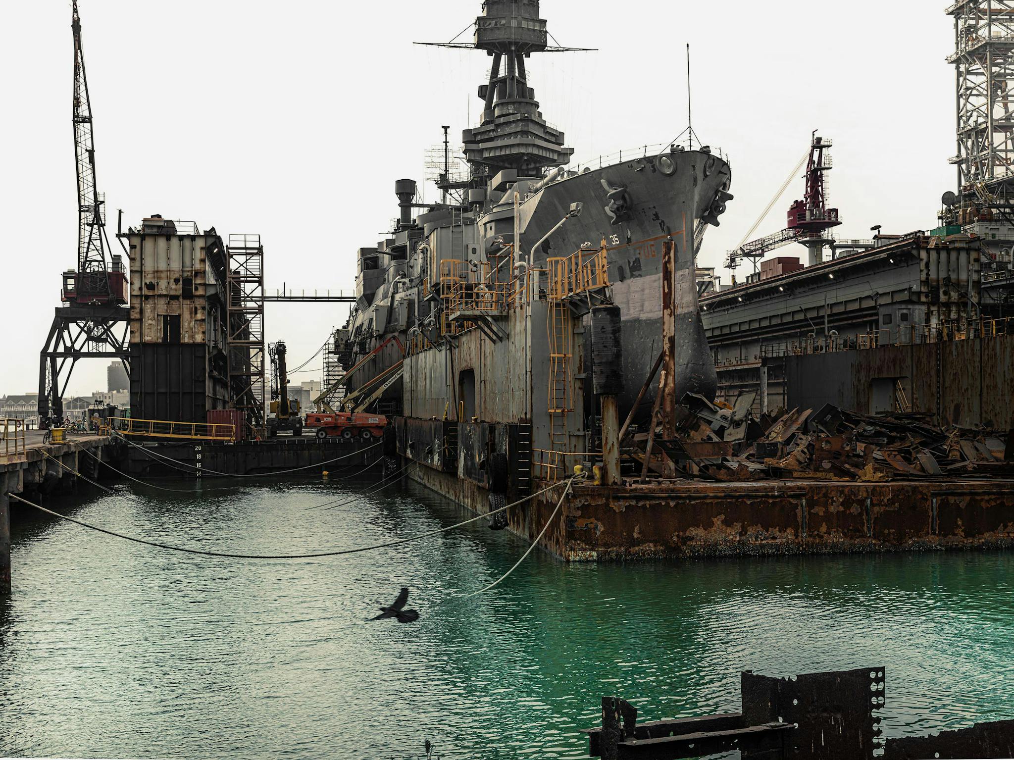 A salvaged dry dock was brought to Gulf Copper and retrofitted for the Texas. It took eight hours to hoist the ship onto the blocks so workers could begin hull repairs.