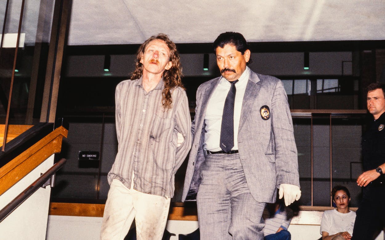 Hector Polanco escorts Gary Merle Scanlan to jail in March 1990.