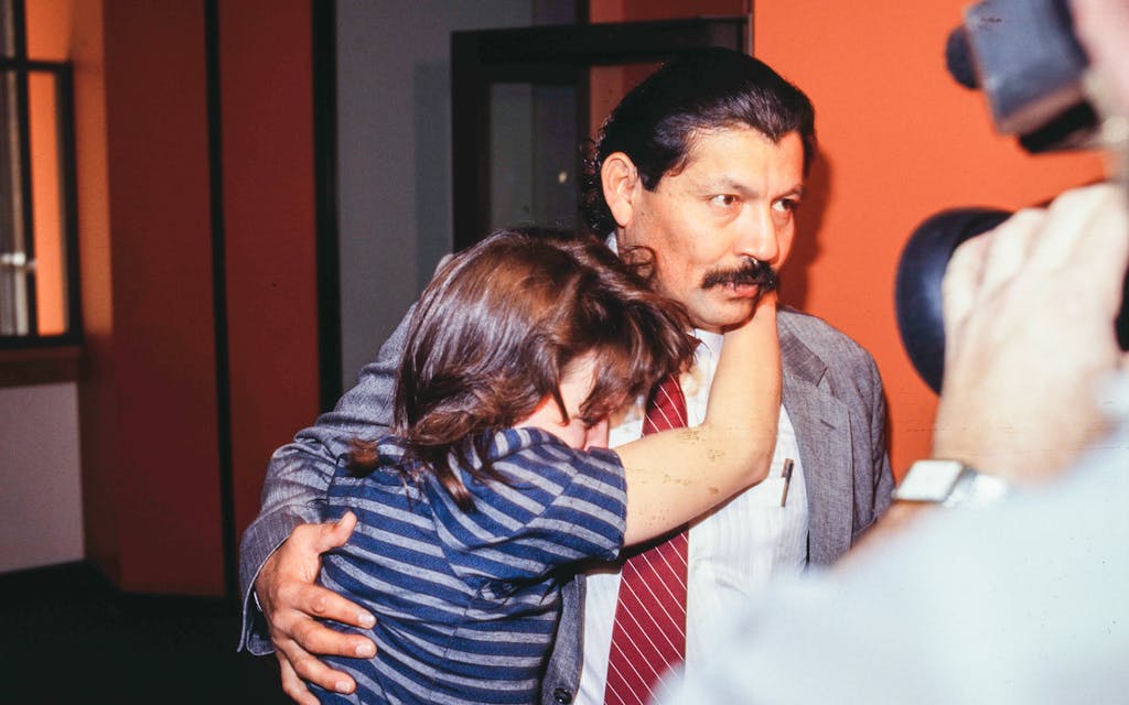 Hector Polanco escorts Robbie Zuiliani to jail in January 1990.