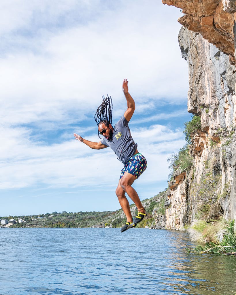 Mario Stanley (just before folding his arms) at Lake Marble Falls.