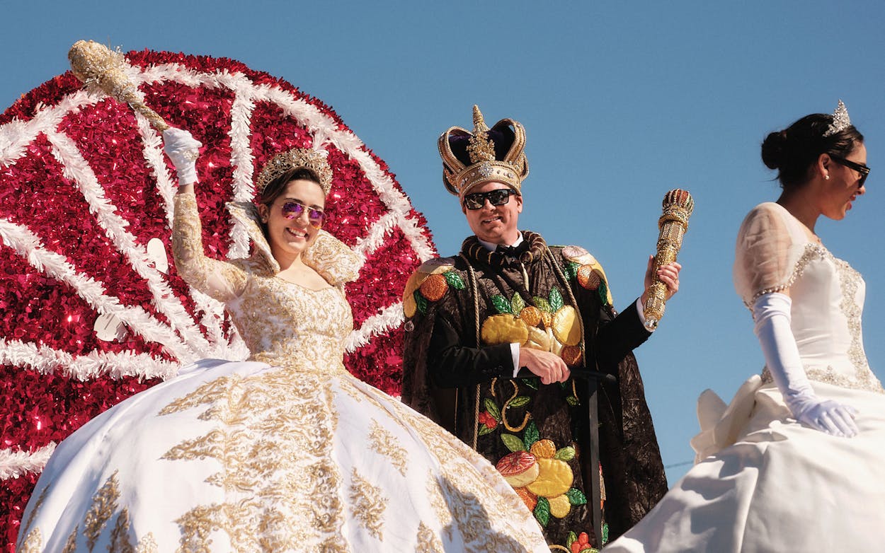 Queen Citriana and King Citrus atop their float in Mission, TX during the annual Texas Citrus Fiesta parade on January 27, 2024.