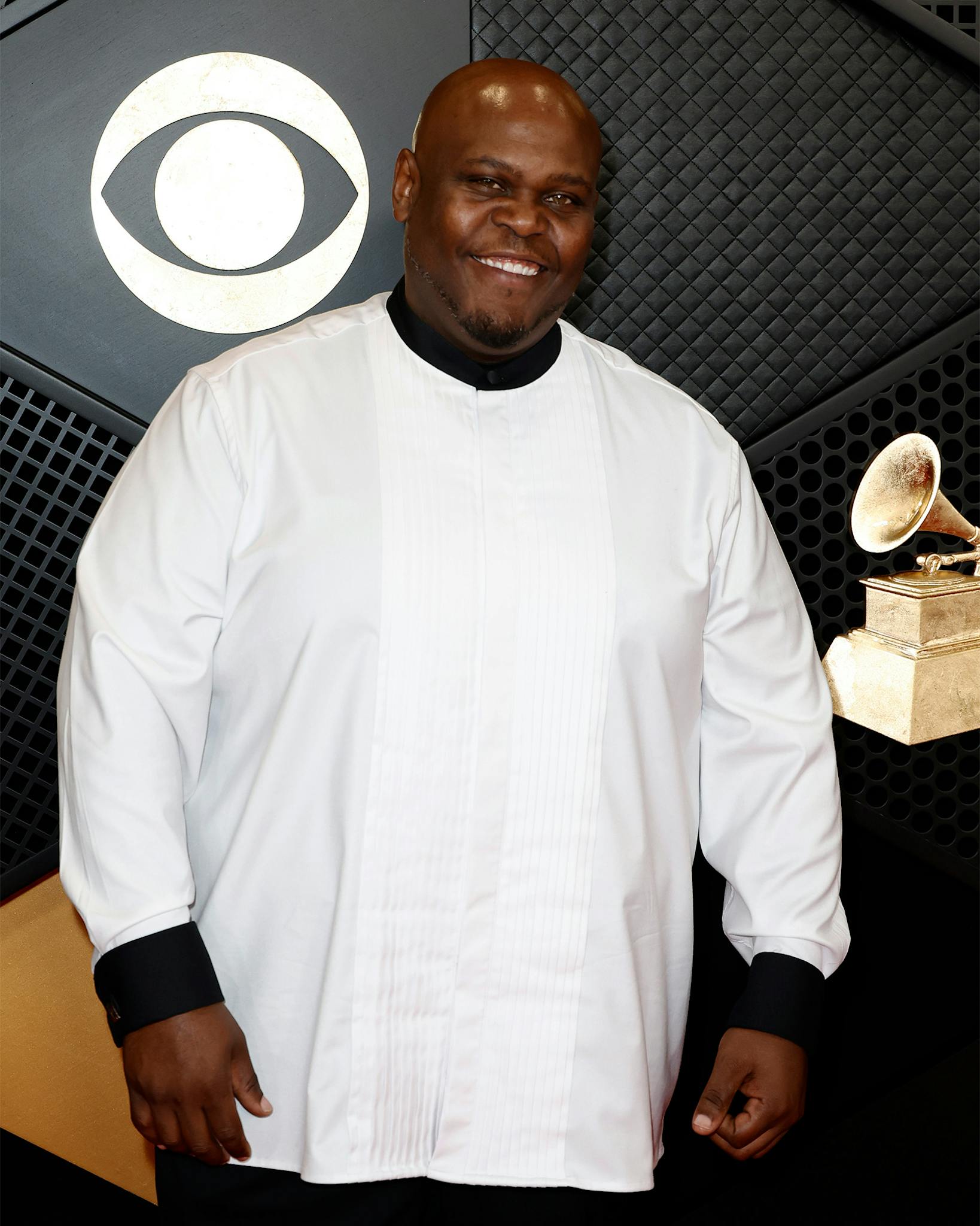 Hip hop recording artist Charles Williams, stage name Chalie Boy, kept it classy on the carpet with a black and white look. Although he was not nominated, his song “I Look Good” is sampled in Grammy-nominated song “On My Mama,” by Victoria Monét. 