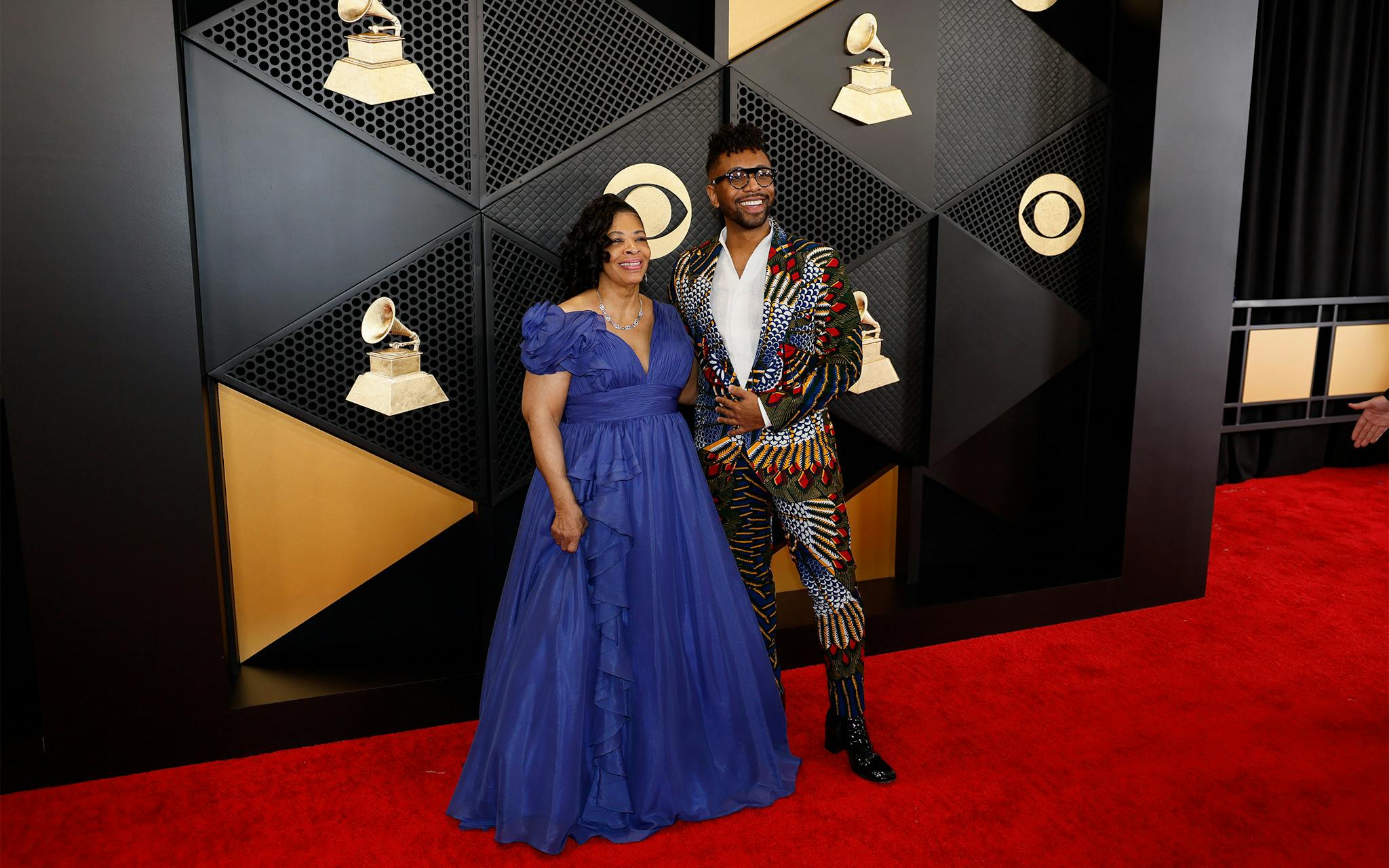 Cellist Seth Parker Woods was touted as one of the best dressed of the night by Variety, and for good reason. Alongside his mother as his date, he wore a colorful suit that resembled the intricate patterns on butterfly wings. He paired the look with a great black statement cowboy boot. 