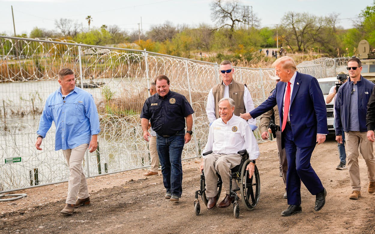 Former President Donald Trump talks with Governor Greg Abbott in Eagle Pass during a visit to the U.S.-Mexico border on February 29, 2024.