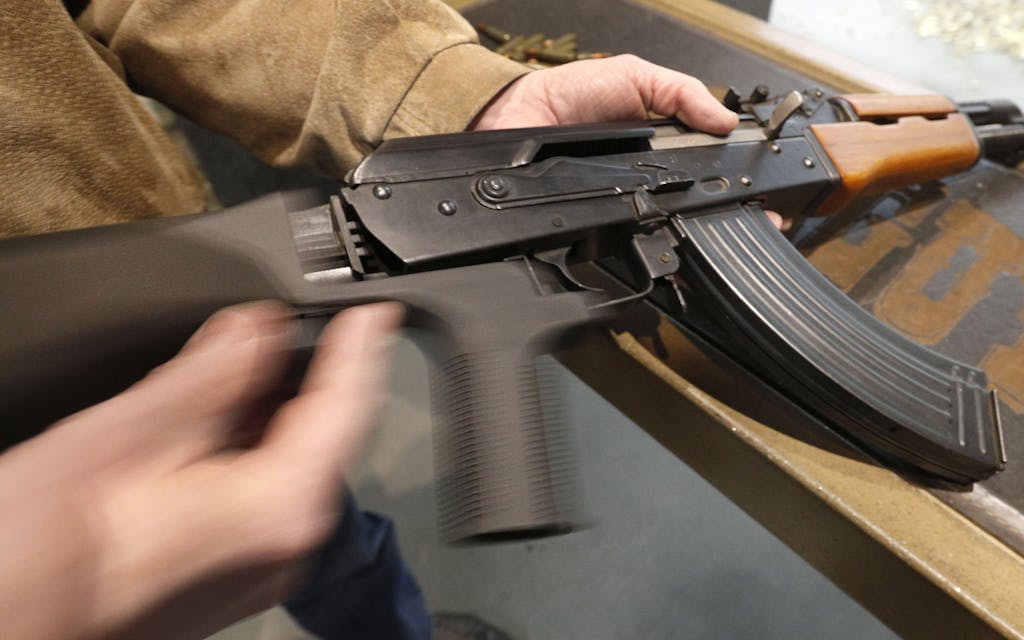 A bump stock is installed on an AK-47 and its movement is demonstrated at Good Guys Gun and Range on February 21, 2018 in Orem, Utah. The bump stock is a device when installed allows a semi-automatic to fire at a rapid rate much like a fully automatic gun.