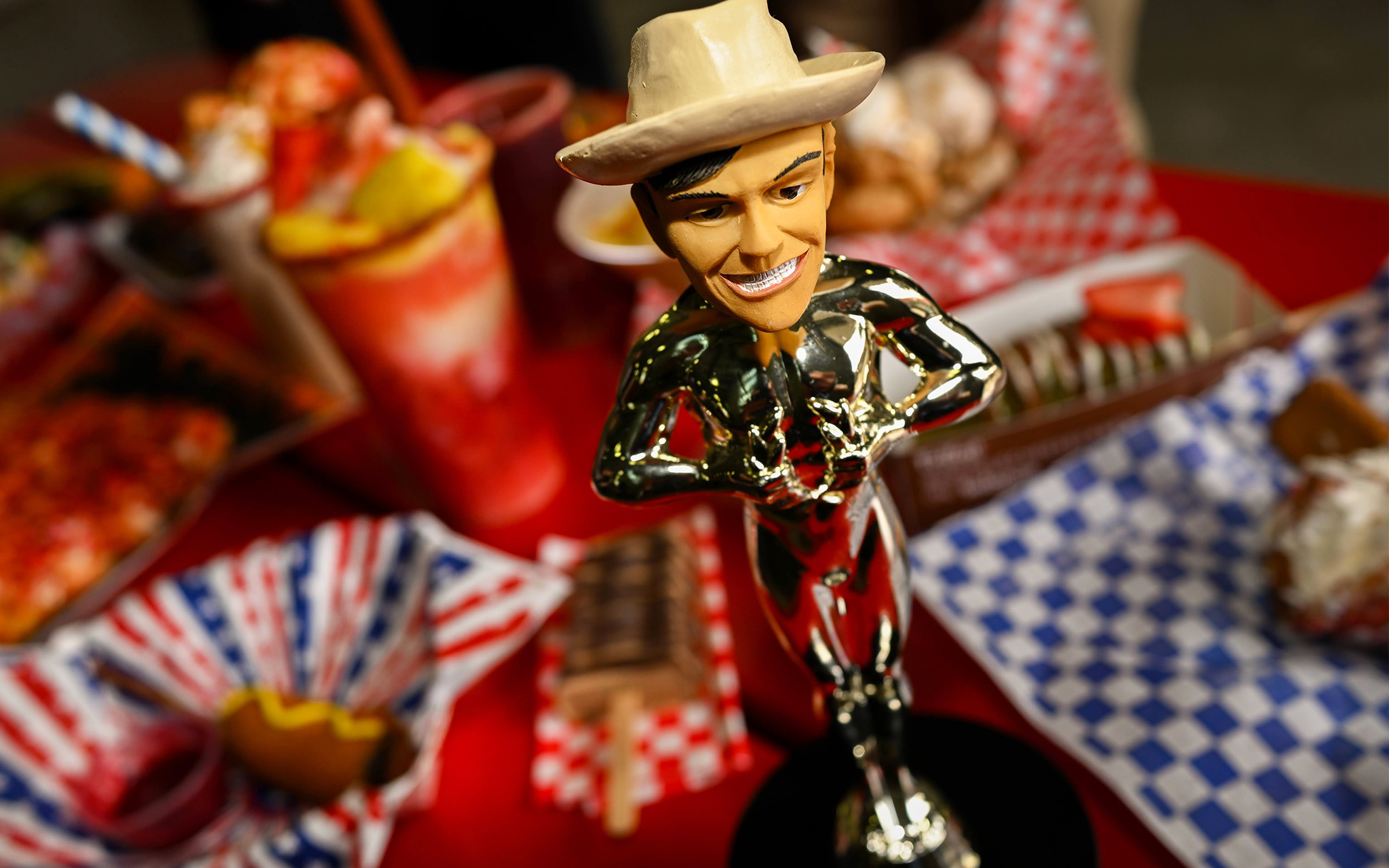 photo of trophy surrounded by food