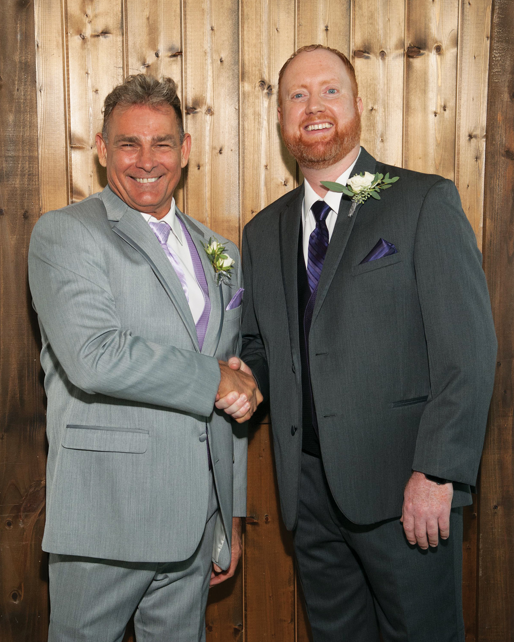 photo of two men in wedding attire