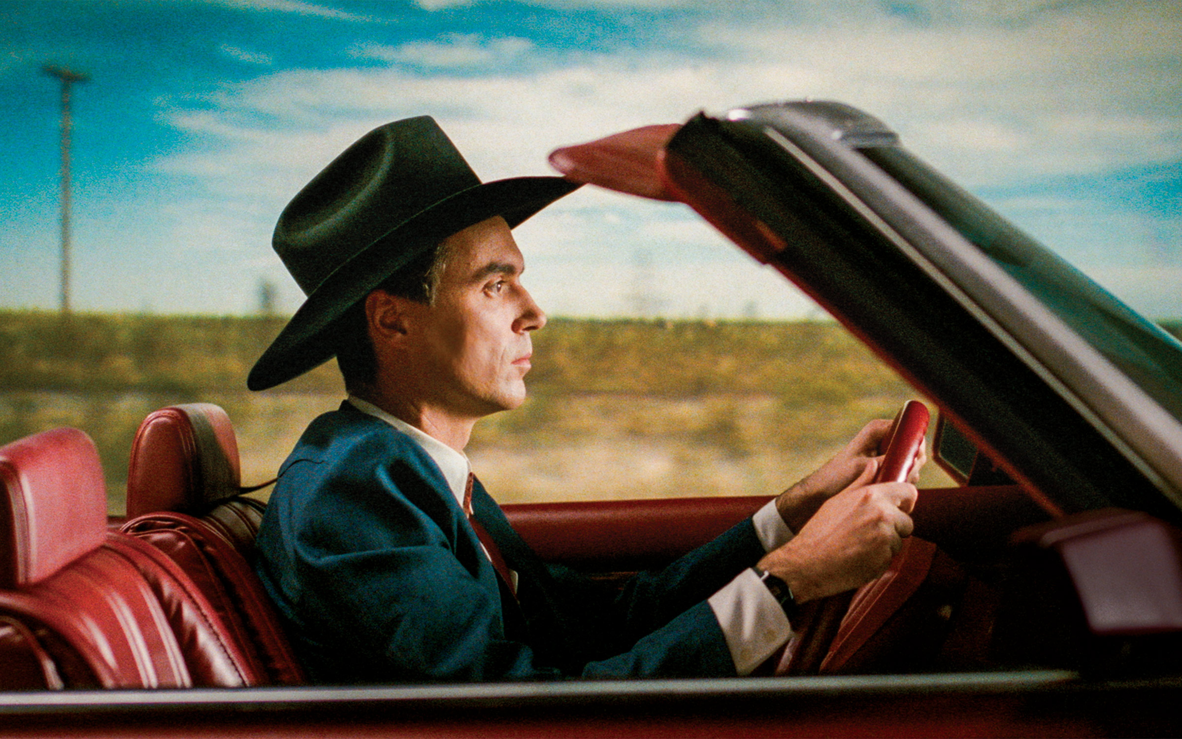 still of byrne behind the wheel