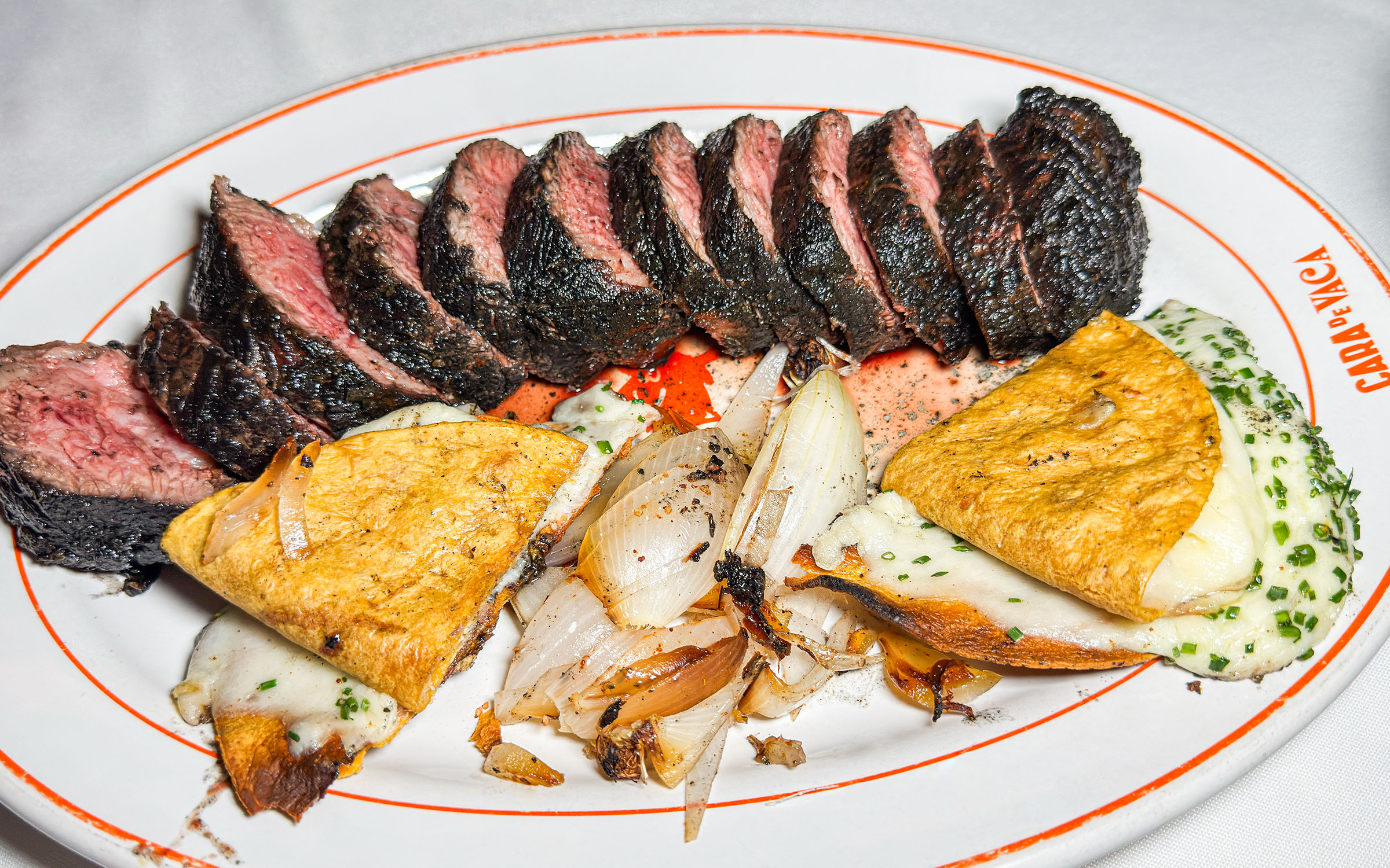 Asado de tira with black garlic, served with quesadillas, at Cara de Vaca in Monterrey, Mexico.