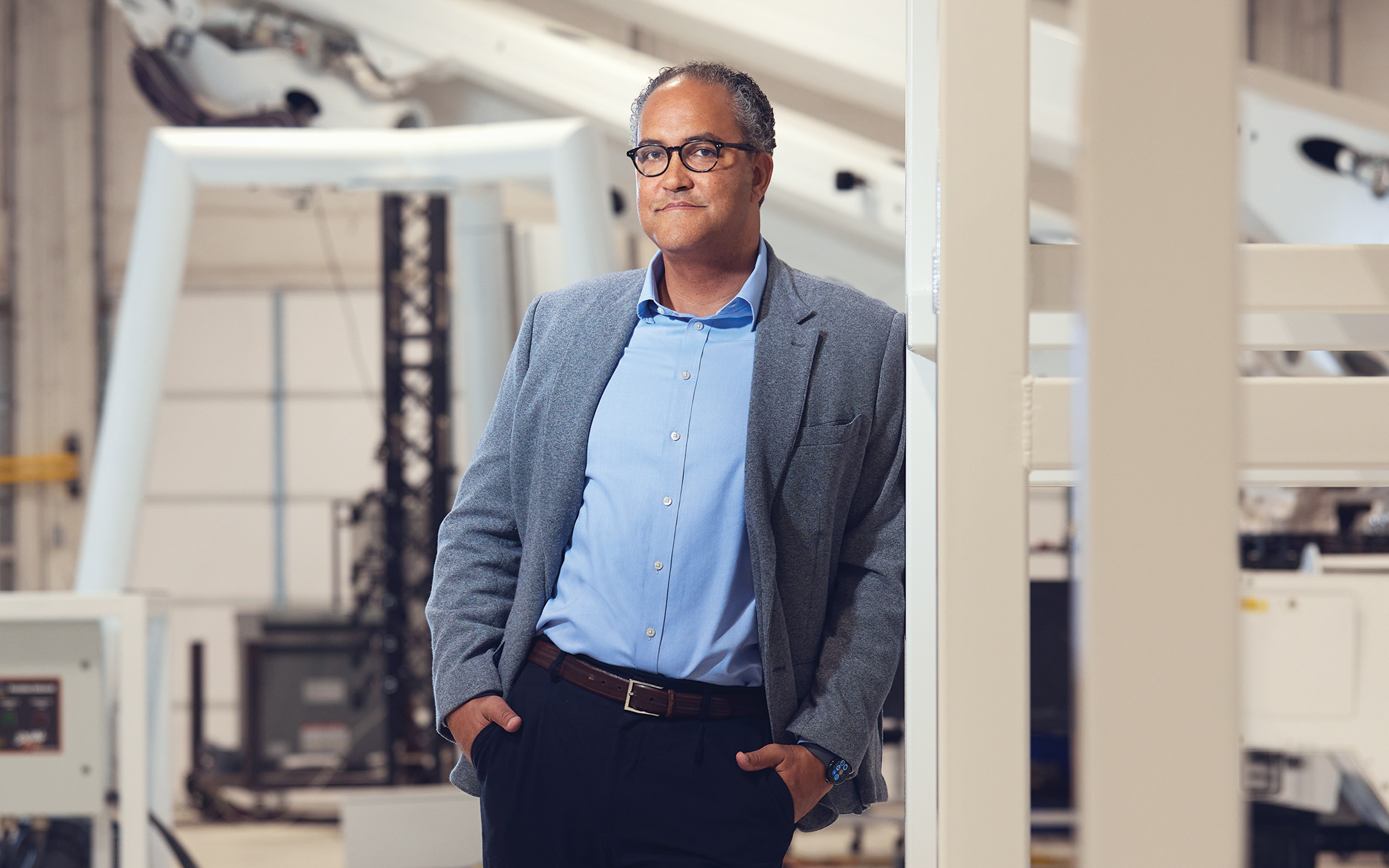photo of Hurd standing in factory